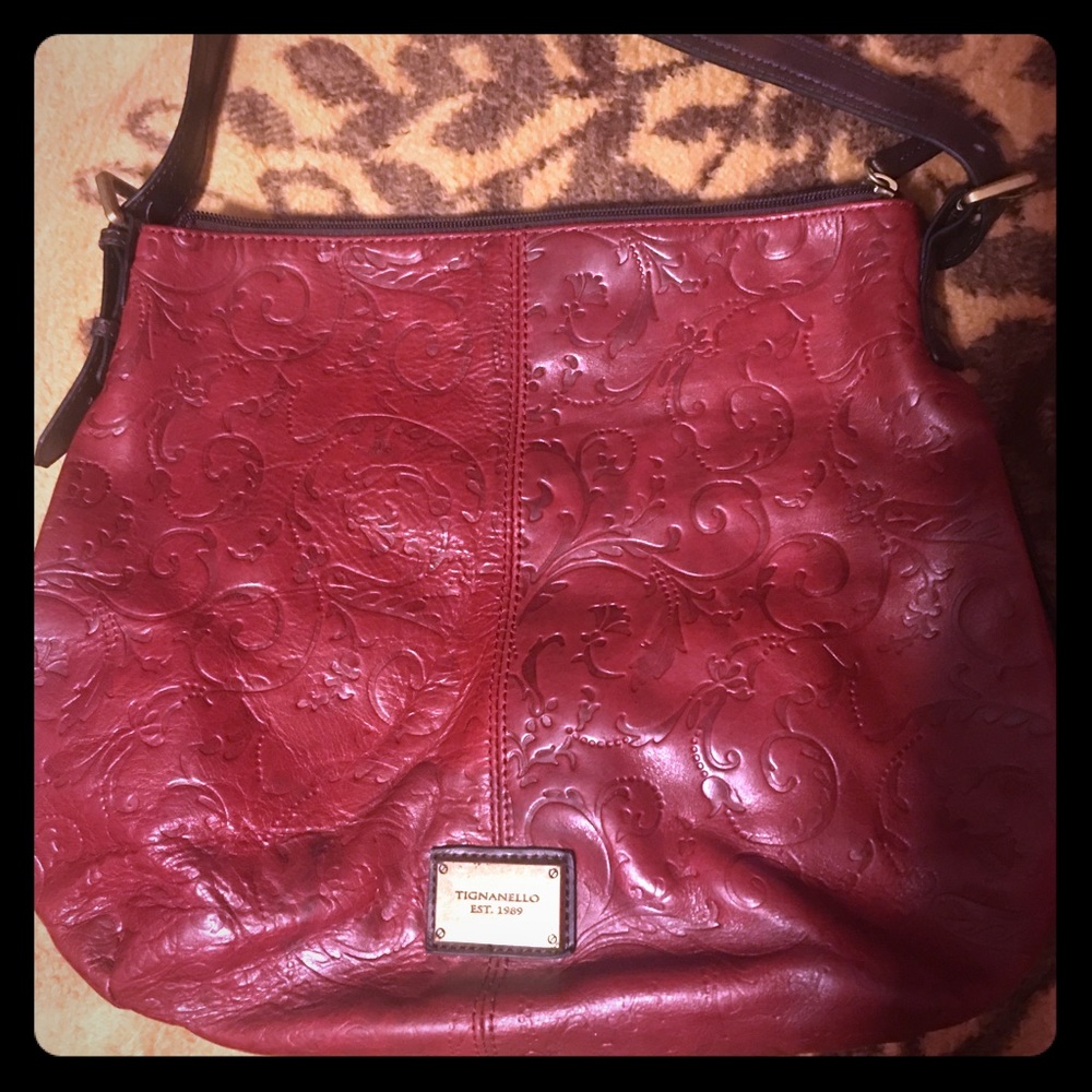 Red leather purse with side pockets